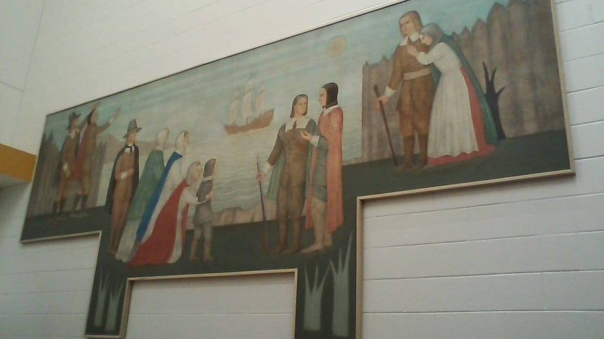 Depression era mural repaired and restored at Freeman Elementary School