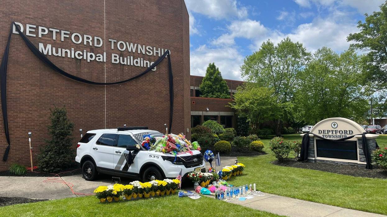 Deptford Police Officer Robert Shisler died on May 7, 2023. His patrol car has been covered in flowers, flags and other tributes to the 27-year-old.