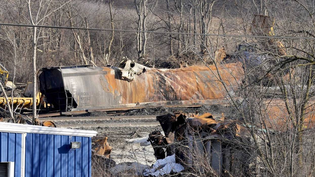 Derailed train cars along East Taggart Street in East Palestine, Ohio as crews continue cleanup Tuesday, February 14, 2023.