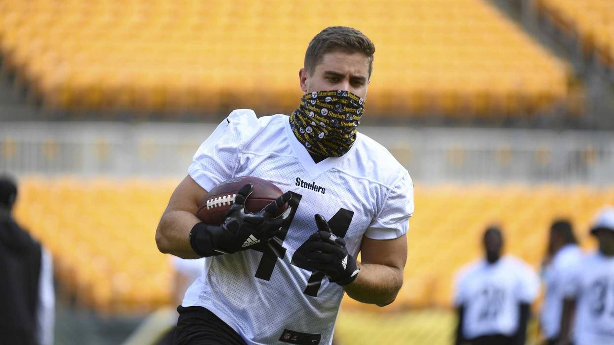 Derek Watt with football