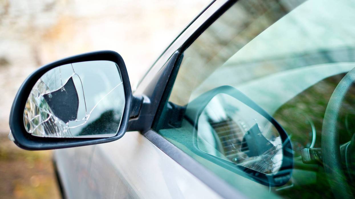 Detail Of Broken Back Mirror Of Car