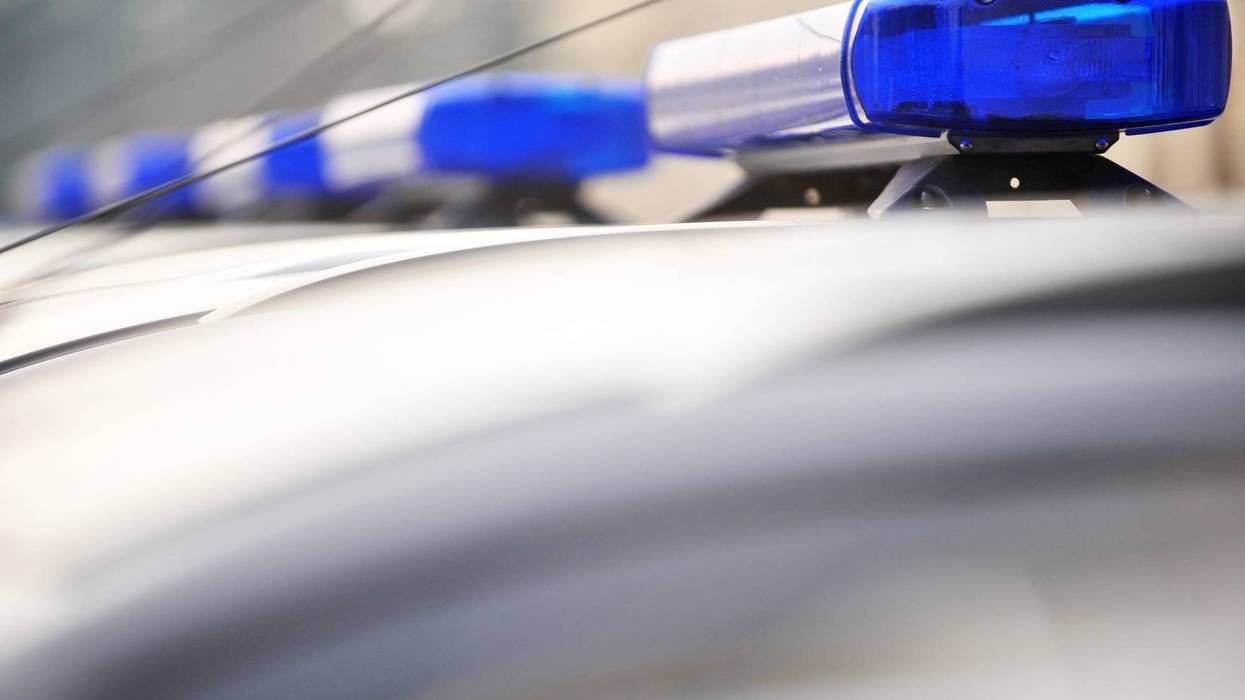 Detail with police blue siren lights on a car
