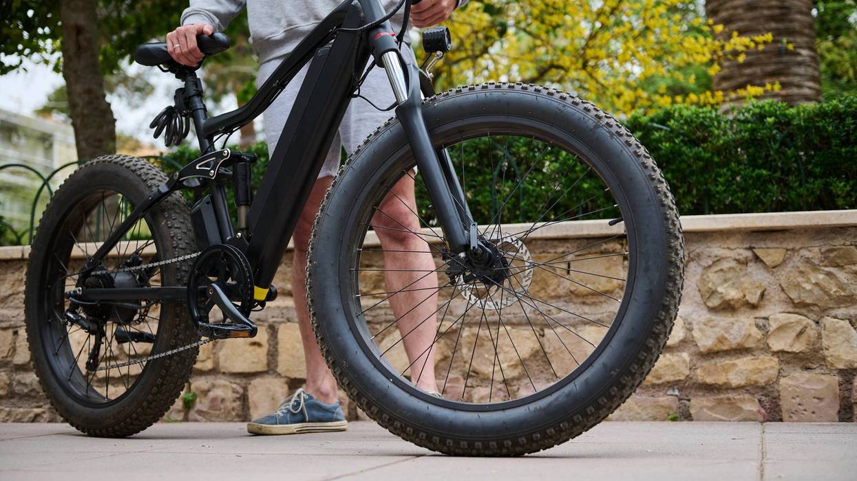 Details on modern ecologically friendly electric bike in the city, ready for rent. Bike sharing city service