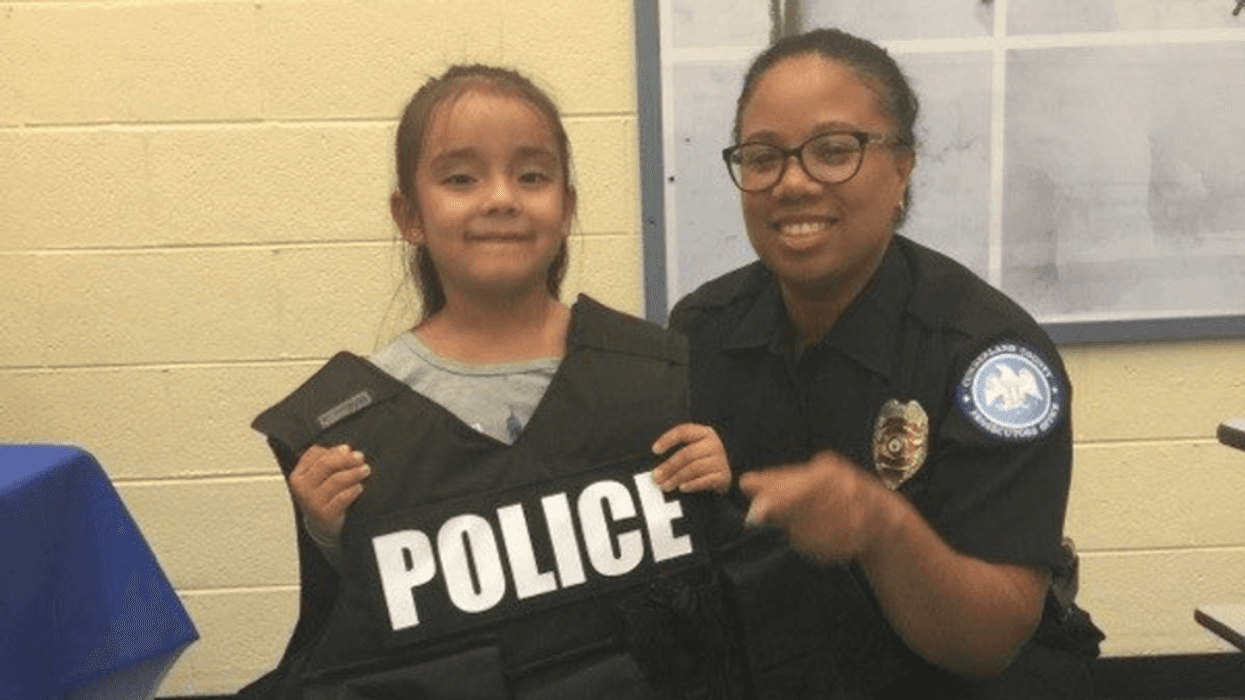 Detective Sgt. Monica Mosley and a child
