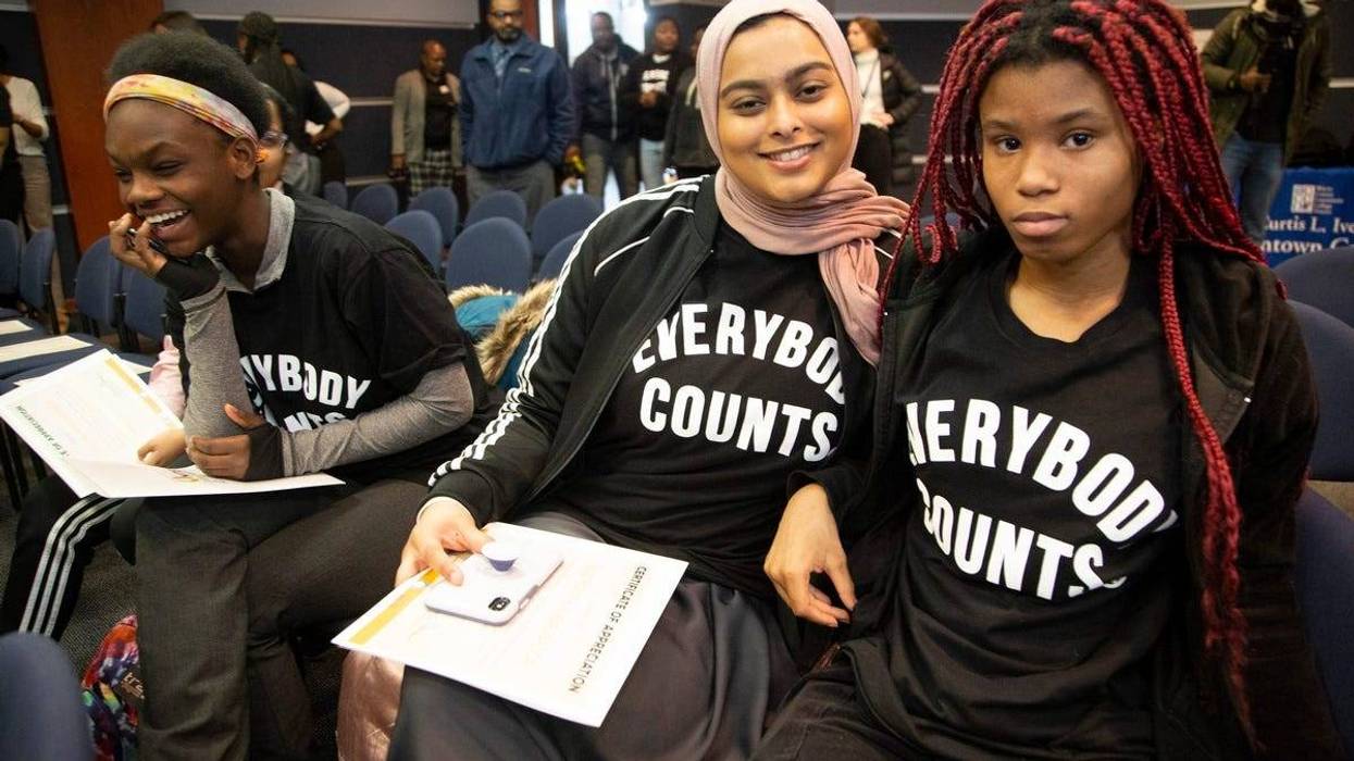 Detroit International Academy students Olivia Shines, 16, of Detroit, left, sit with friends Mahmuda Chowddhury, 16, of Detroit and Jasmine Whitson, 17, of Detroit during a census rally was that wa held for hundreds of metro Detroit high school students at the Wayne County Community College in Detroit Friday, Jan. 31, 2020