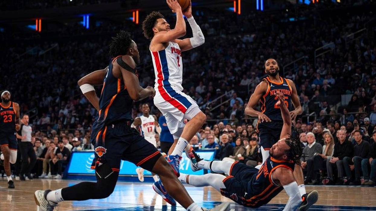 Detroit Pistons guard Cade Cunningham scores and knocks down New York Knicks guard Jalen Brunson