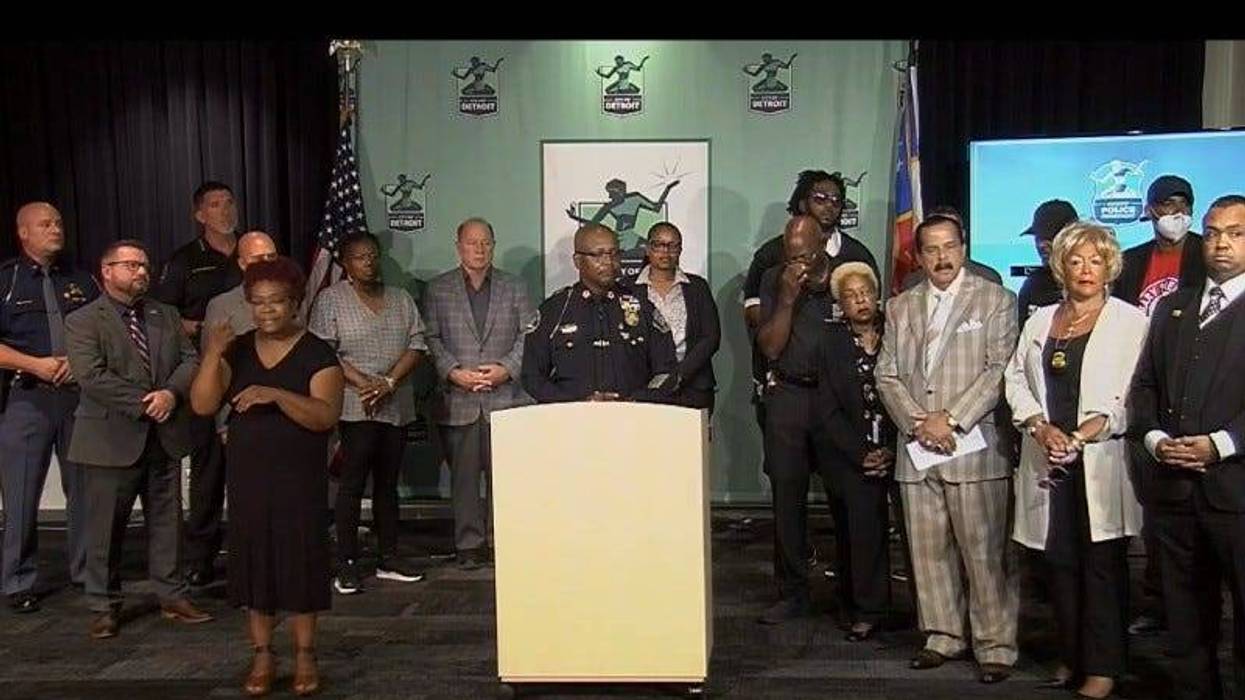 Detroit Police Department press conference. Police Chief White, Mayor Duggan and law enforcement leaders / partners stand on stage in front of speaker's podium.