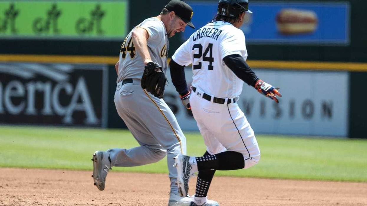 Detroit Tigers designated hitter Miguel Cabrera (24) is grounded out to first base by Pittsburgh Pirates pitcher Rich Hill (44) during the second inning at Comerica Park in Detroit