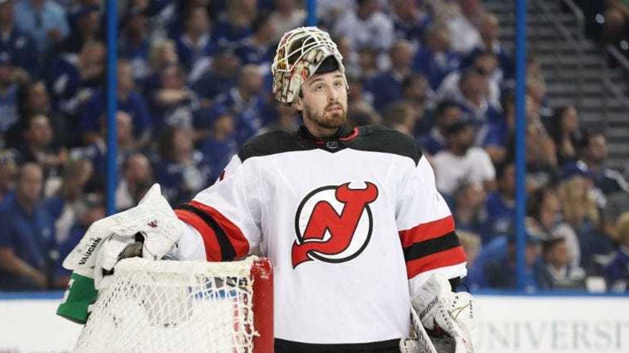 Devils goaltender Keith Kinkaid loses his mask after a collision with the Florida Panthers on Nov. 26, 2018, at BB&T Center in Sunrise, Florida.