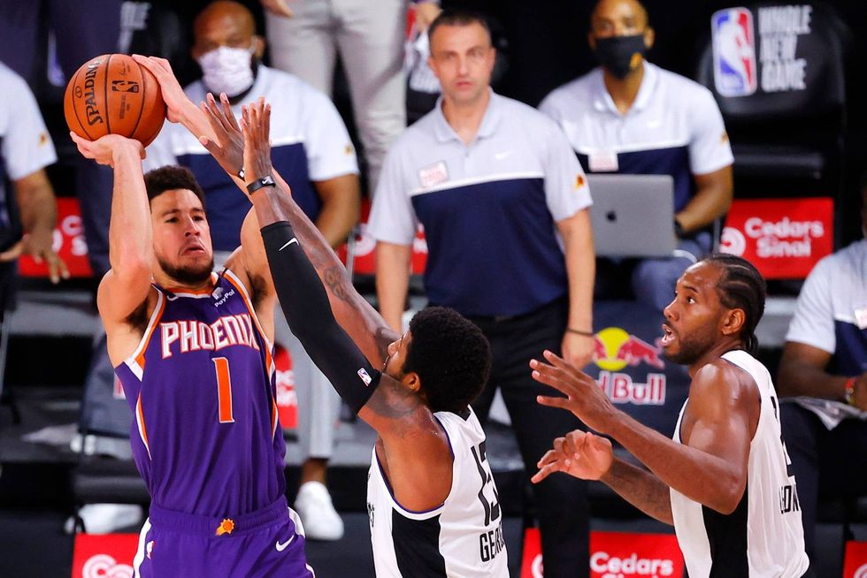 Devin Booker draining a buzzer-beater against Los Angeles