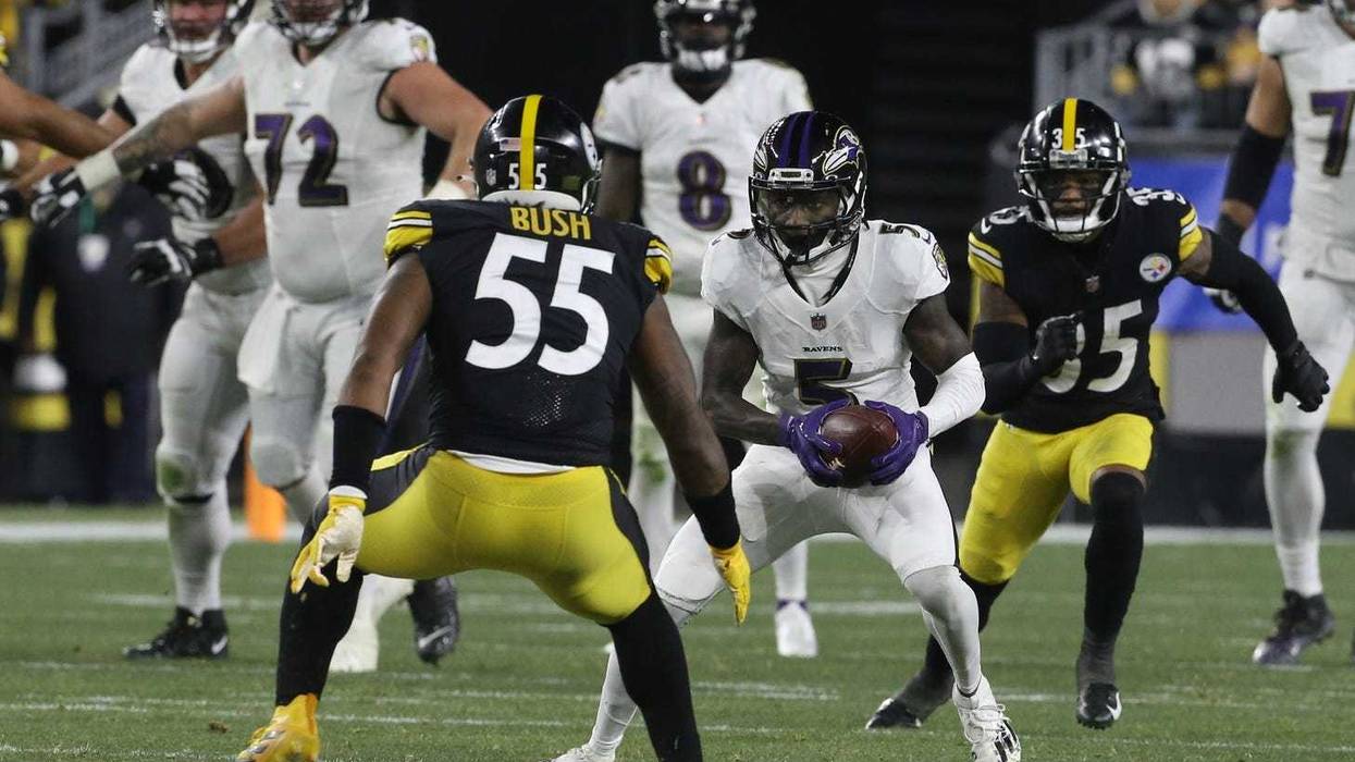Devin Bush about to make a tackle