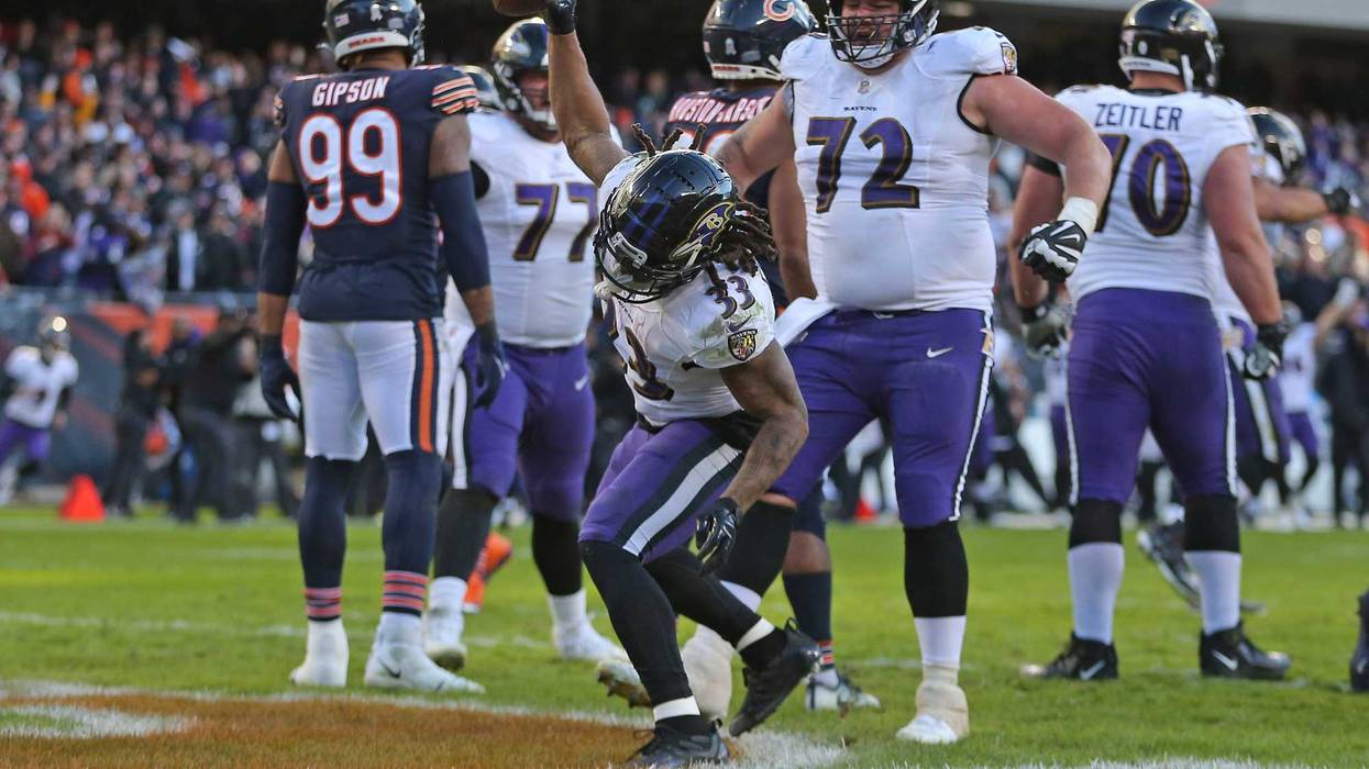 Devonta Freeman spikes the ball after scoring the game-winning TD