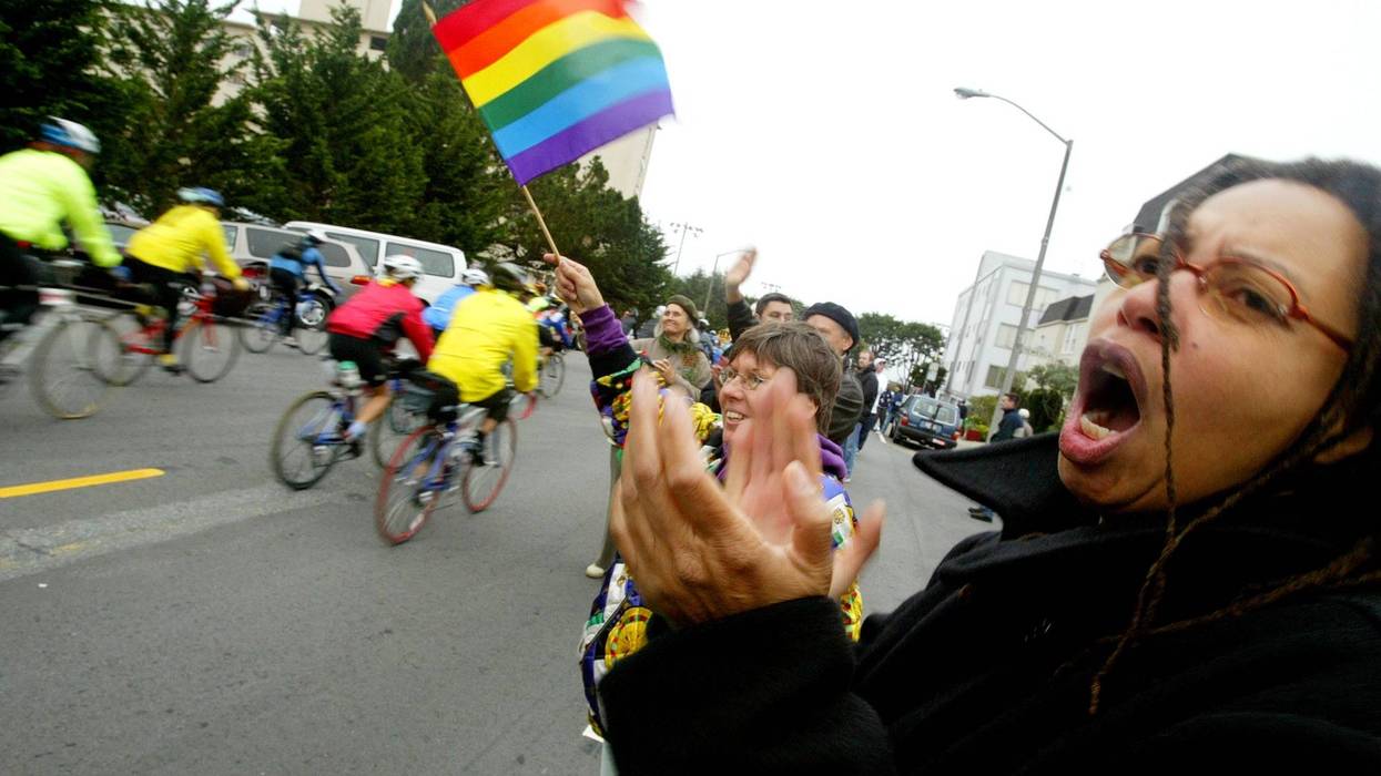 Diane Parker of Alameda, California, cheers cyclists at the beginning of the second annual AIDS/LifeCycle event June 8, 2003 in San Francisco, California.