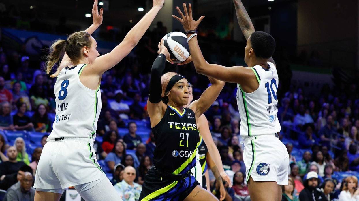 DiJonai Carrington (21) - now a player for the Minnesota Lyx - looks to pass between Lynx forward Alanna Smith (8) and guard Courtney Williams (10) during a game in Dallas back in June.