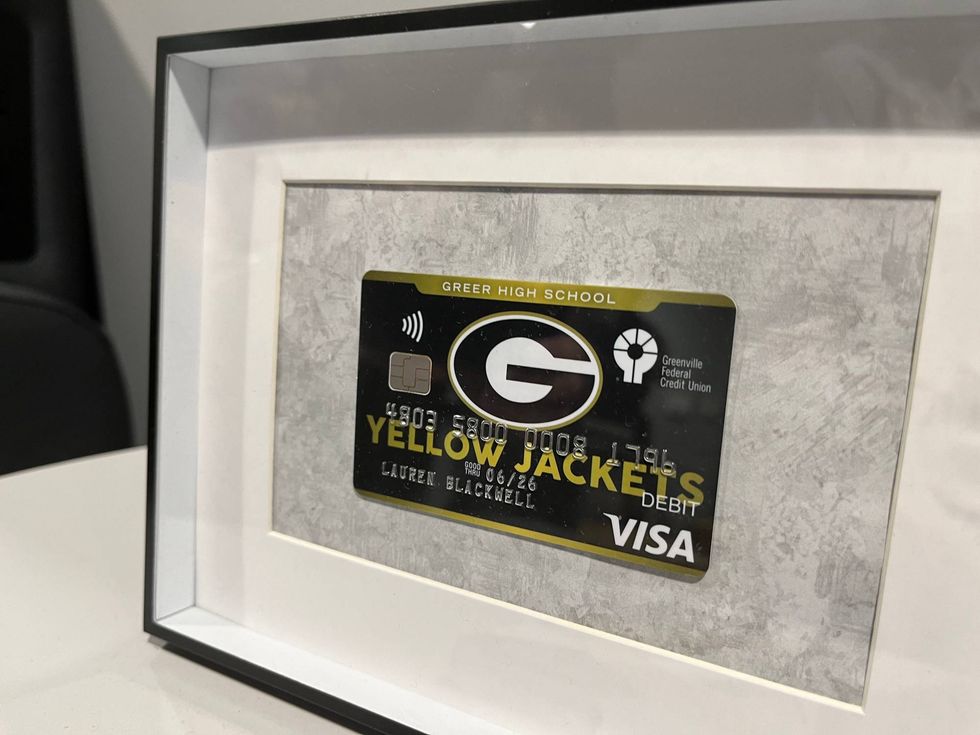 Display of the Greer High School debit card