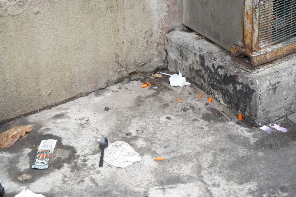 Disposed material in the area of the open air-drug market in the South Bronx.