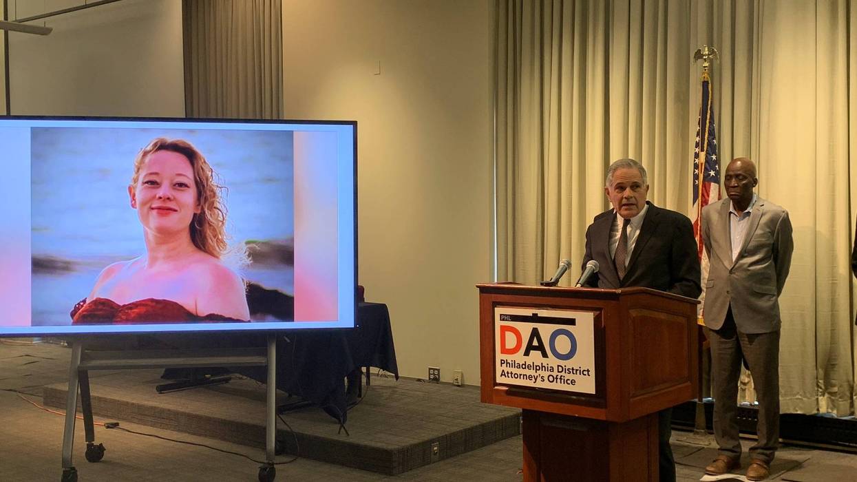 District Attorney Larry Krasner speaks at a press conference on Jan. 8, 2026 alongside a photo of Renee Nicole Good.