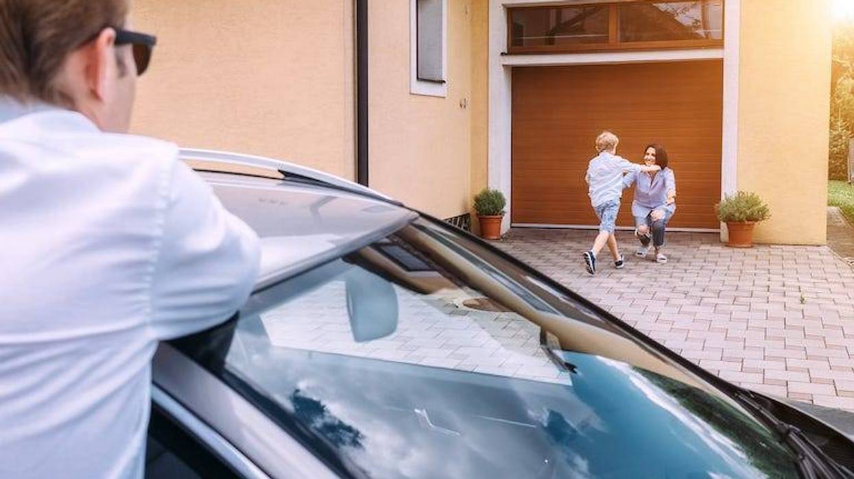 Divorced dad dropping off kid with his mother