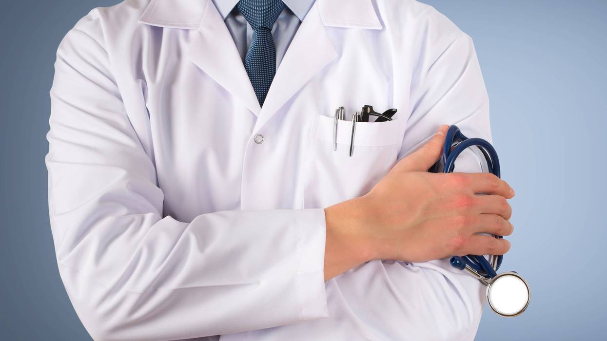 Doctor, Arms Crossed, Blue Background
