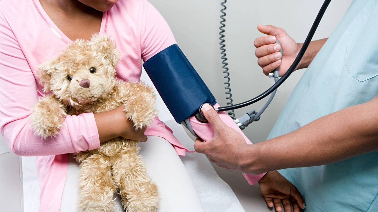Doctor checking girl