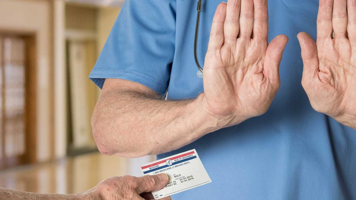 Doctor refusing Medicare stock photo.