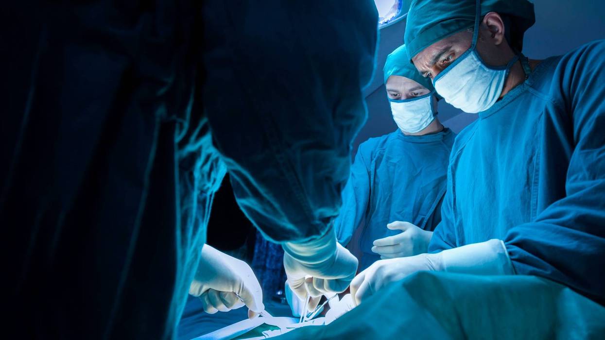 Doctors in surgery.