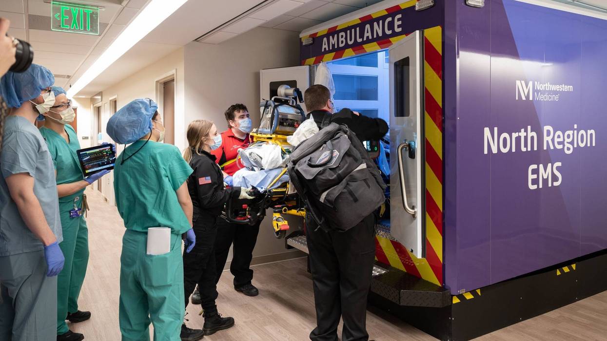 Doctors training on simulated ambulance