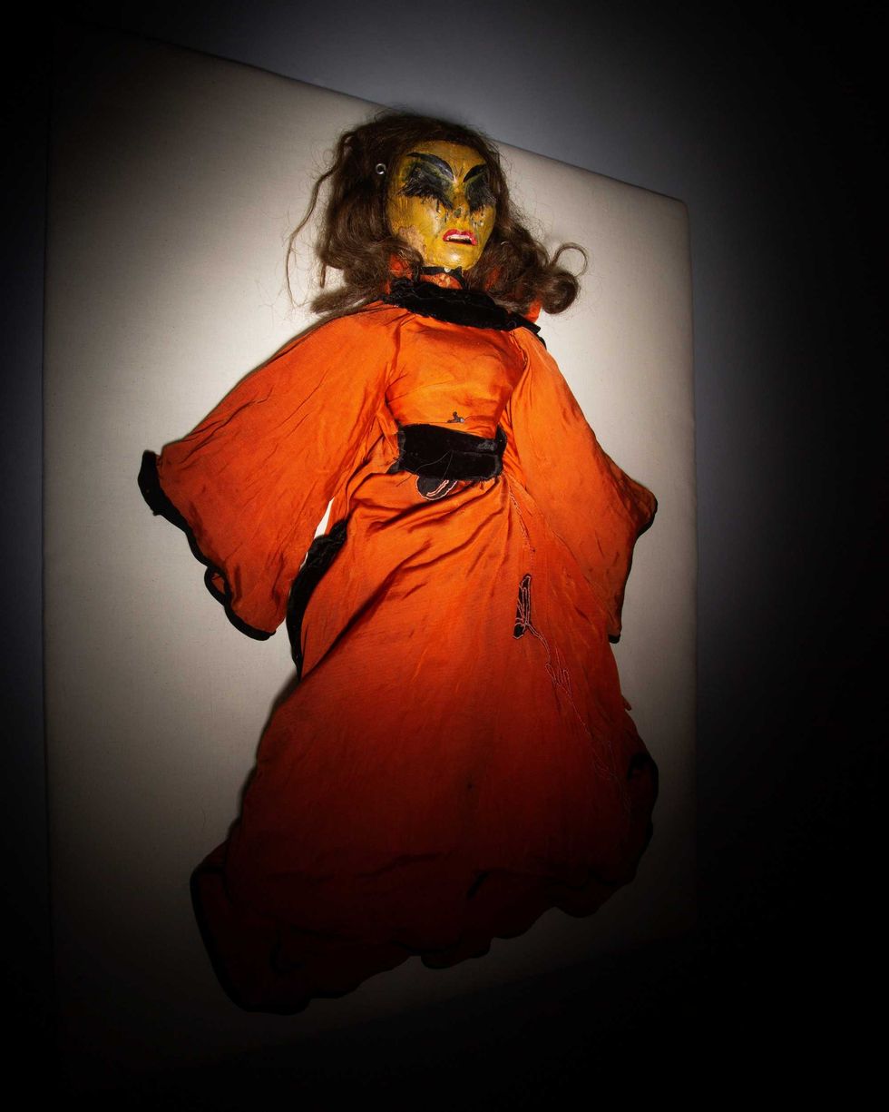 doll in orange dress