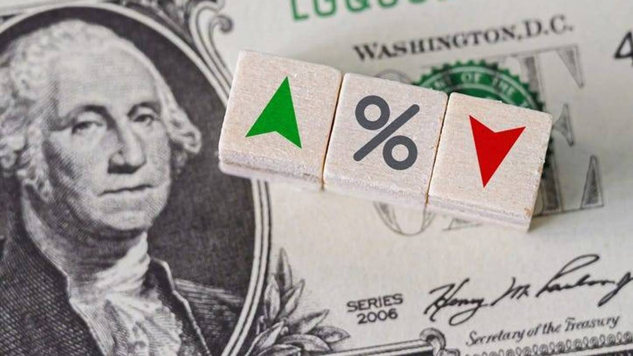 Dollar bill with up and down arrows