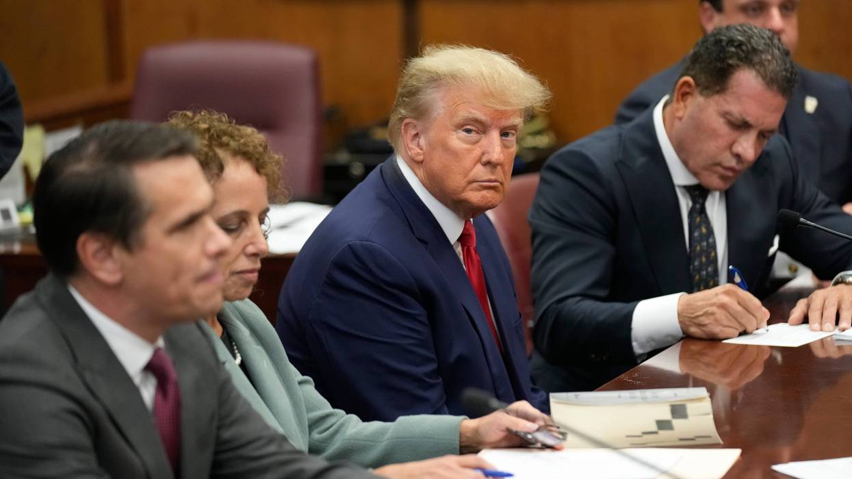 Donald Trump and his legal team in Manhattan court room
