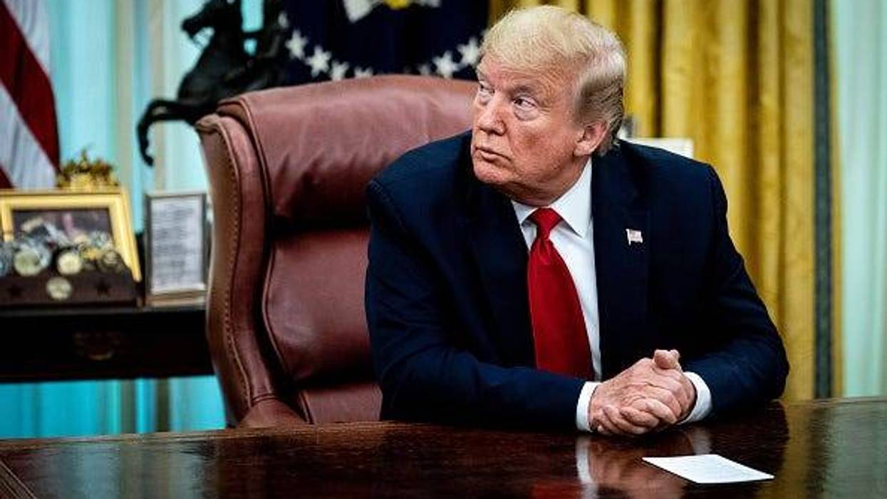 Donald Trump at his desk