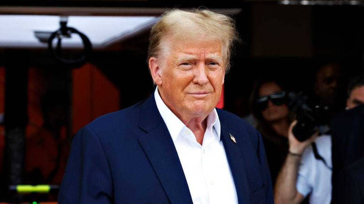 Donald Trump looks on in the Pitlane prior to the F1 Grand Prix of Miami at Miami International Autodrome on May 05, 2024 in Miami, Florida.