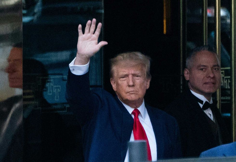 Donald Trump outside Trump Tower minutes before he surrendered at the Manhattan Federal Court on April 4, 2023