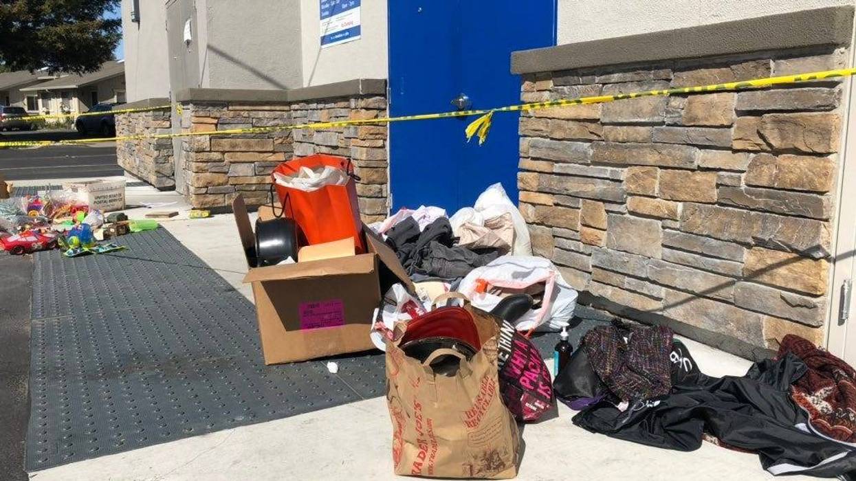 Donations pile up outside of a closed Goodwill store in Concord