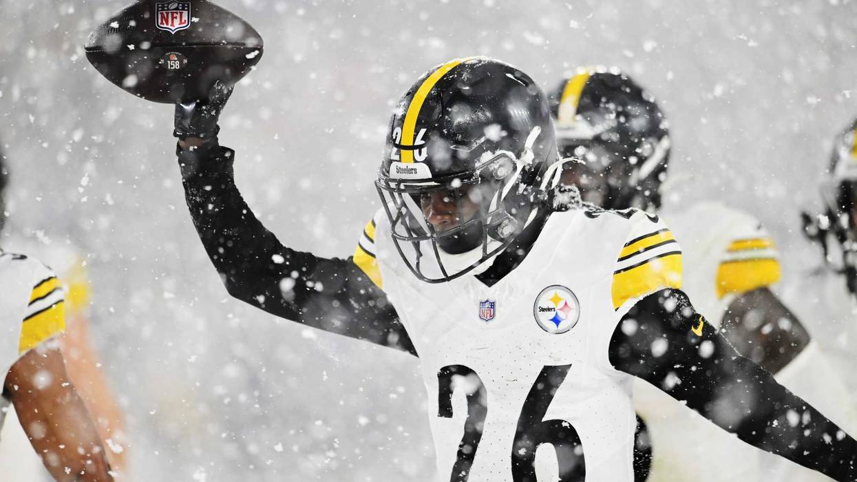 Donte Jackson with ball in snow