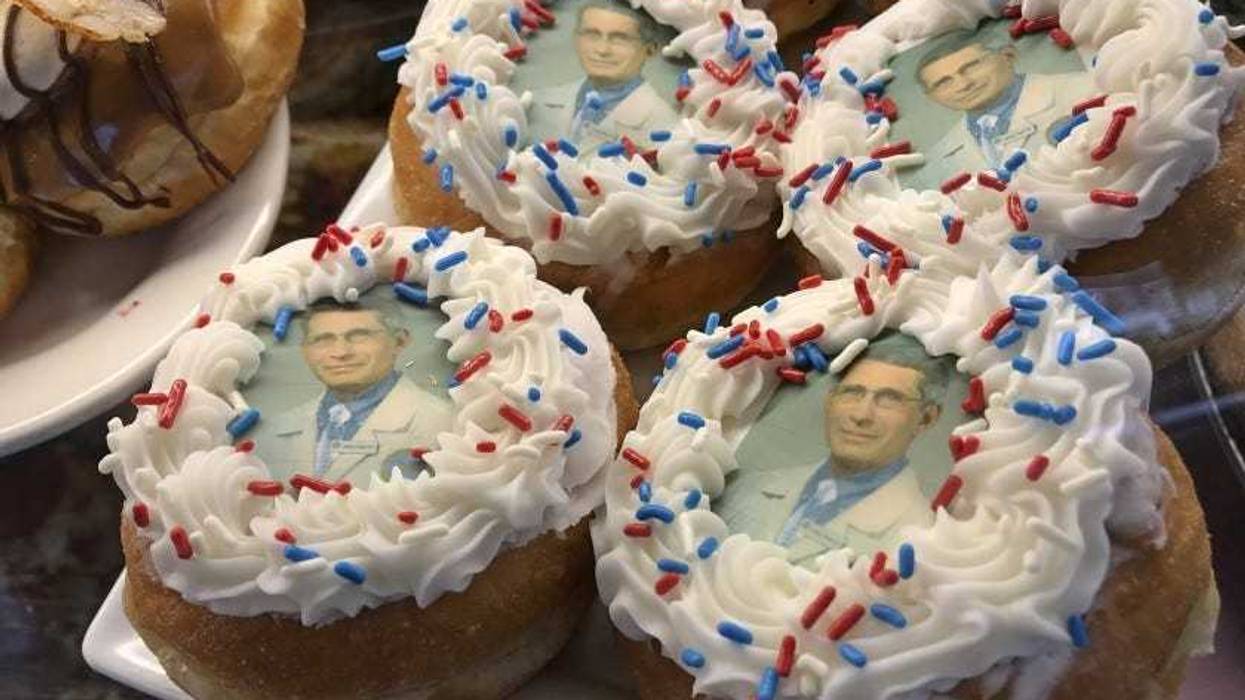 donuts bearing the likeness of Dr. Anthony Fauci, director of the National Institute of Allergy and Infectious Diseases, rest on a plate at Donuts Delite in Rochester, N.Y. Donuts Delite began making donuts featuring Fauci’s face earlier in the week.
