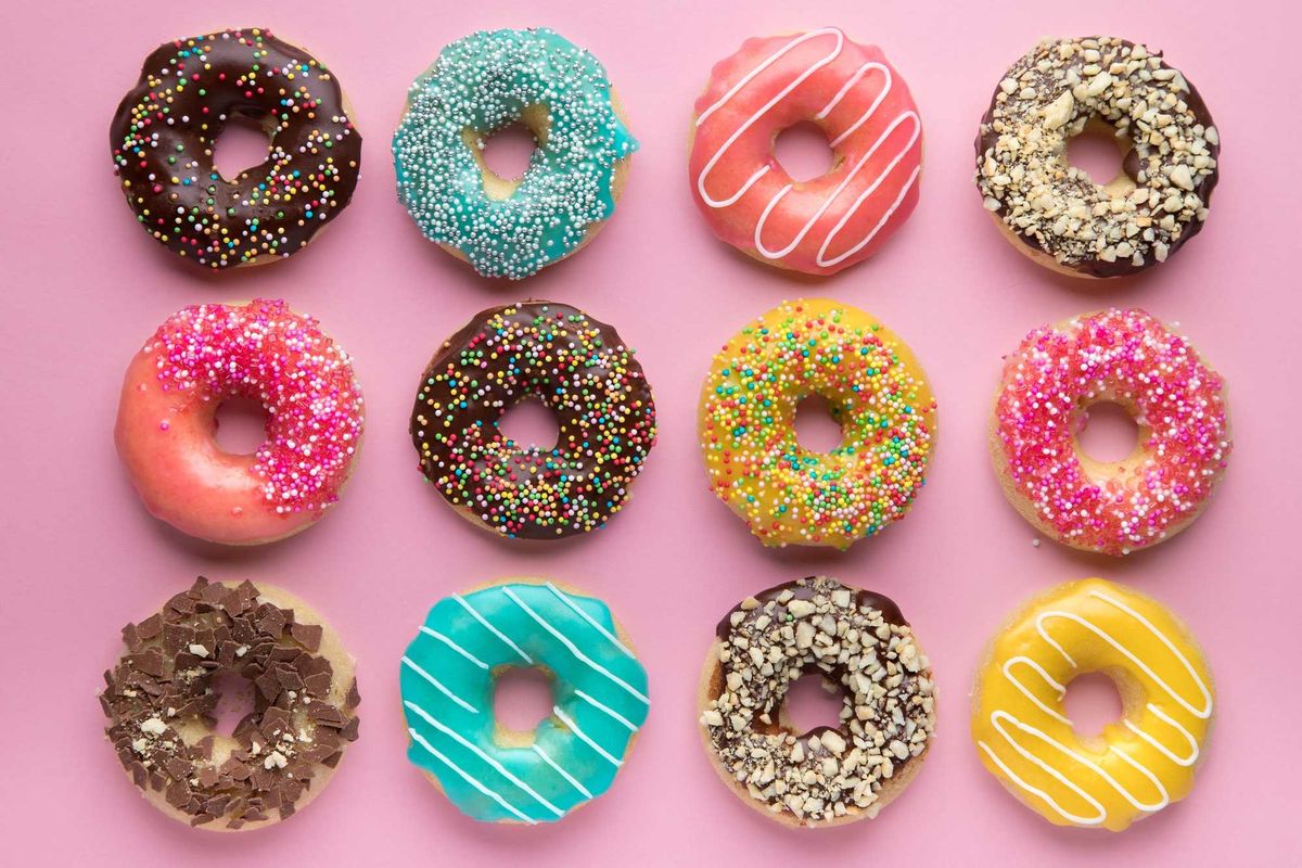 Donuts on pink background stock photo