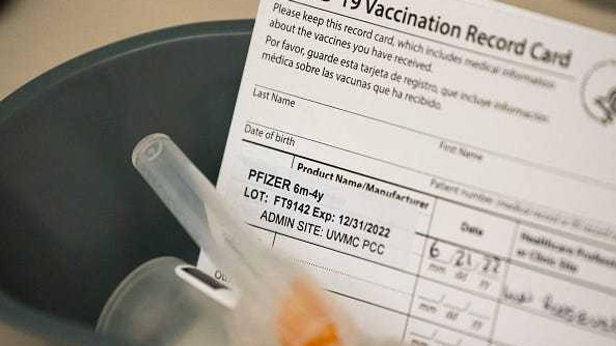Doses of the Pfizer Covid-19 vaccine and vaccination record cards await pediatric patients at UW Medical Center - Roosevelt on June 21, 2022 in Seattle, Washington.
