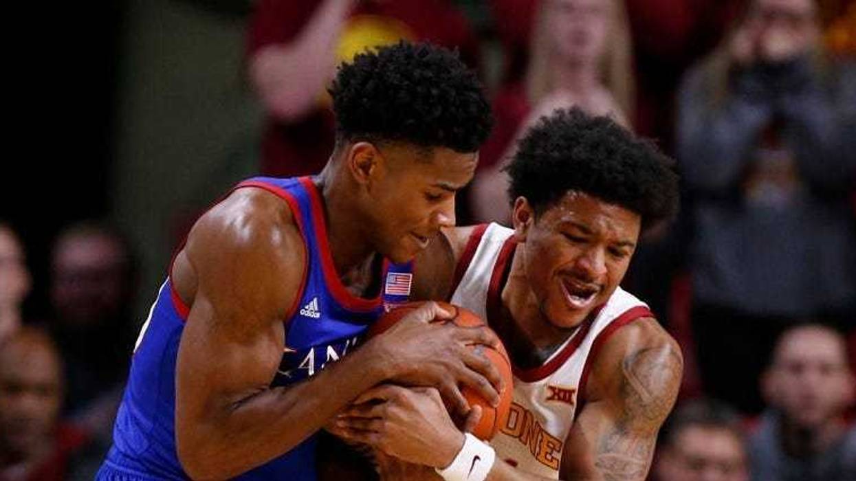 Dotson scores 20 points, No. 3 Kansas routs Iowa State 79-53