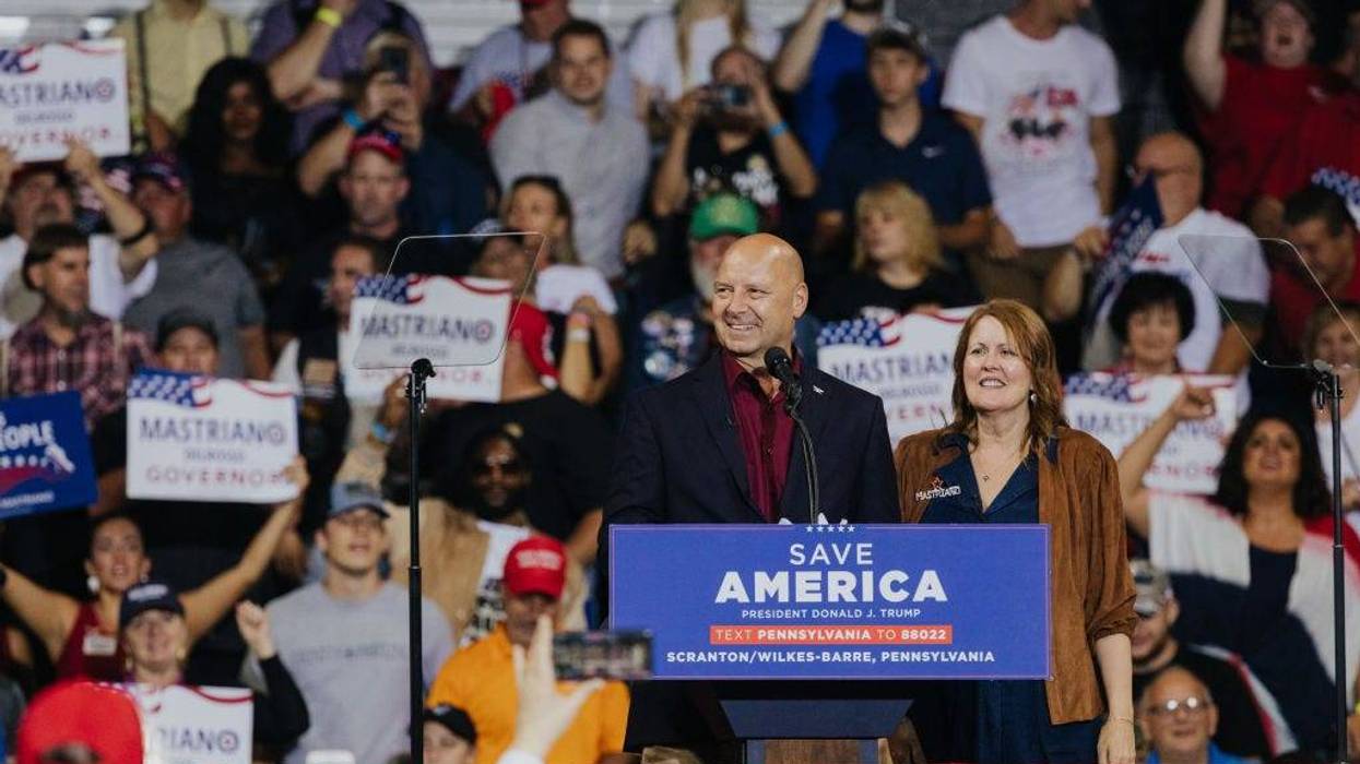 Doug Mastriano, the Republican gubernatorial candidate for Pennsylvania, speaks alongside his wife, Rebbeca Mastriano, during a rally with former President Donald Trump in Wilkes-Barre, Pennsylvania, on Sept. 3, 2022.