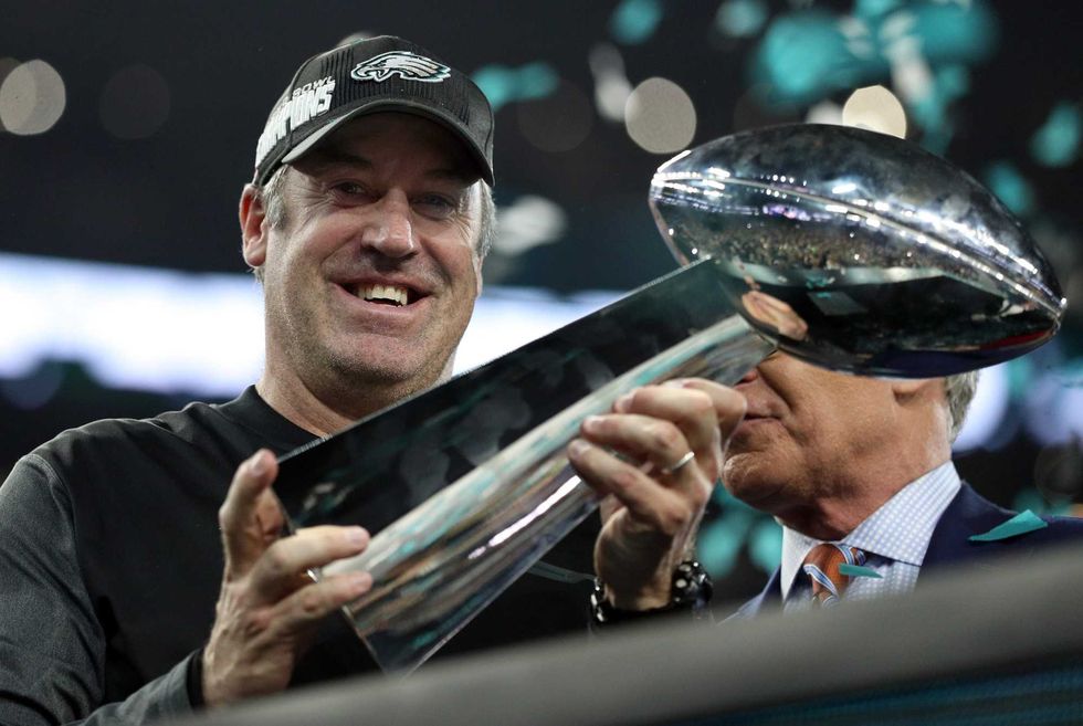 Doug Pederson smiles with Super Bowl trophy