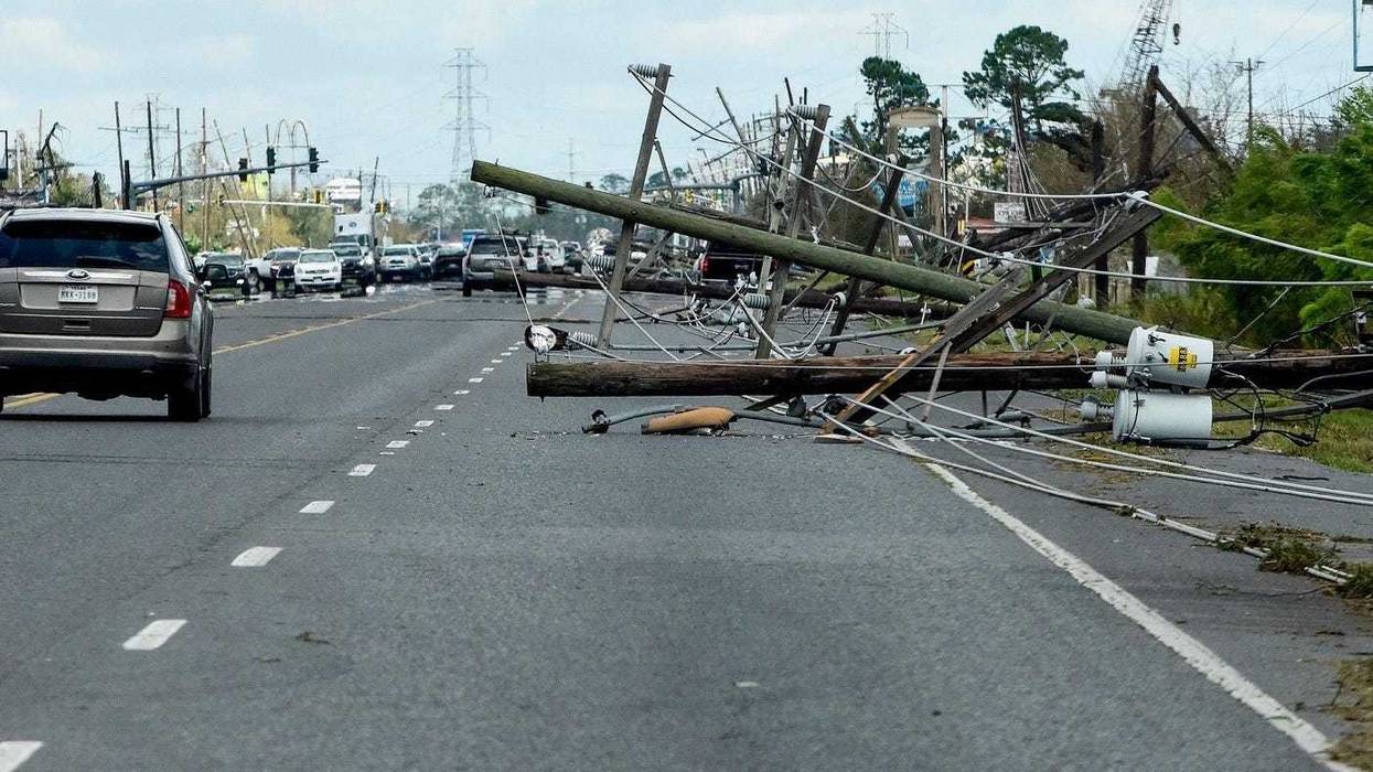 Downed power lines along Highway 61 in LaPlace, Louisiana, after Hurricane Ida came ashore on Sunday August 29, 2021.