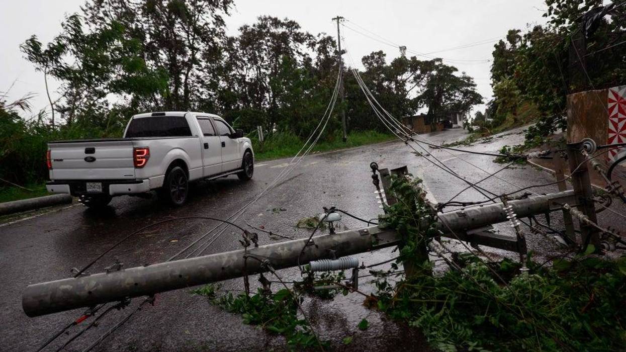 Downed power lines on road PR-743 in Cayey ,Puerto Rico as the island awoke to a general power outage on September 19, 2022 in San Juan, Puerto Rico.