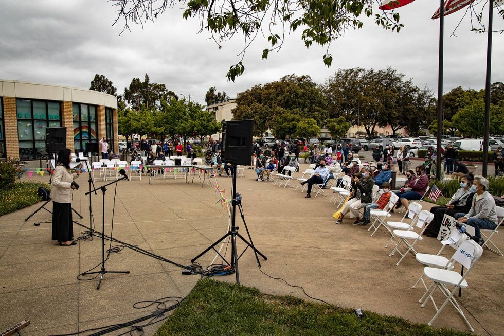 Dozens gather at rally against AAPI hate in San Leandro.