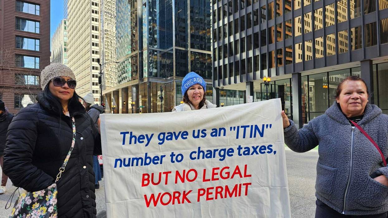 Dozens of demonstrators took to Chicago's Federal Plaza on Saturday to call on city and federal leaders to provide work permits to undocumented workers who have long lived in the United States.