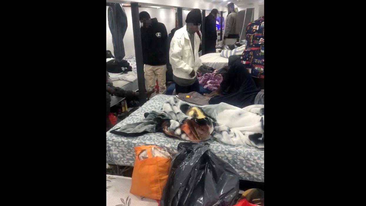 Dozens of people were found living at a commercial establishment on Liberty Avenue in South Richmond Hill, sources said