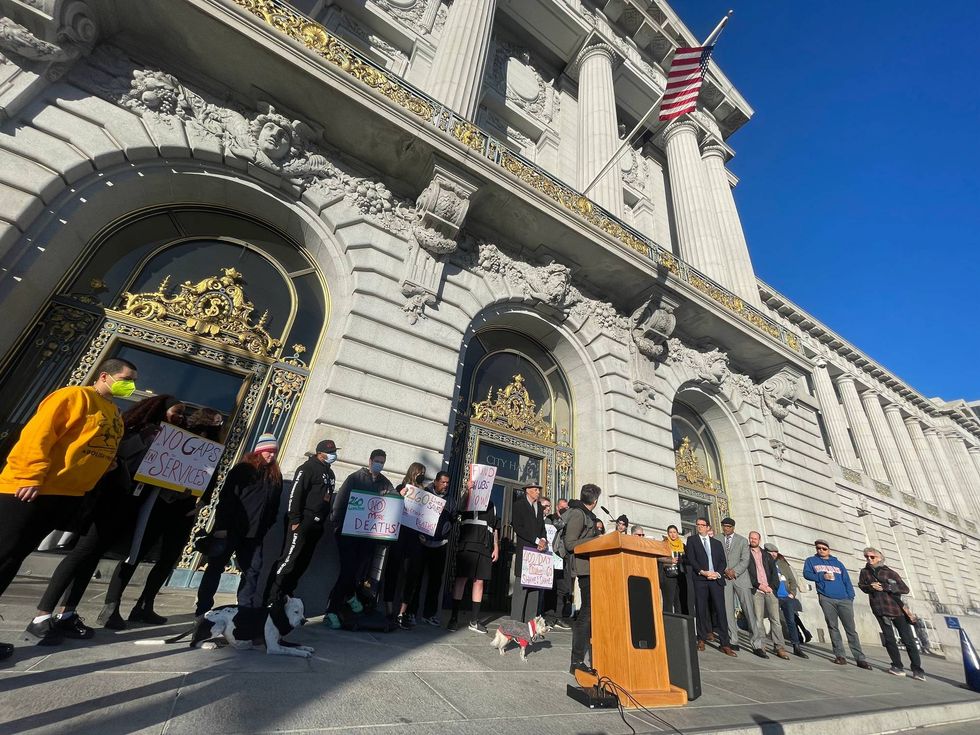 Dozens protested the Tenderloin Center