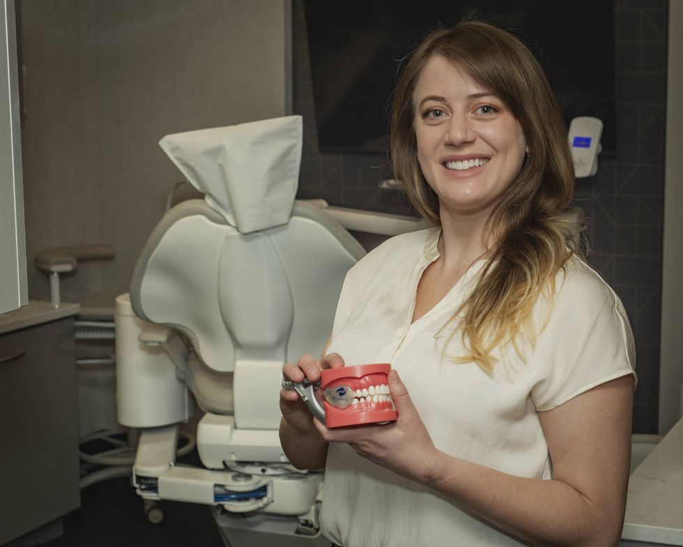 Dr. Andrea Morris holding Remvia