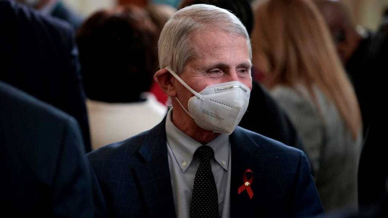 Dr. Anthony Fauci, Director of the National Institute of Allergy and Infectious Diseases and the Chief Medical Advisor to the President, speaks with guests after U.S. President Joe Biden delivered remarks to commemorate World AIDS Day at the White House on December 01, 2021 in Washington, DC.