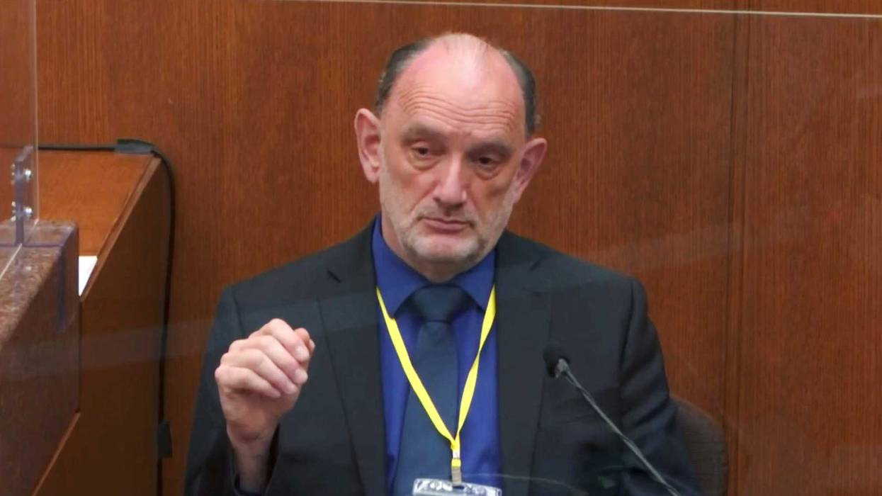 Dr. David Fowler, a retired forensic pathologist and former chief medical examiner for the state of Maryland testifies as Hennepin County Judge Peter Cahill presides, on April 14, 2021, in the trial of former Minneapolis police Officer Derek Chauvin at the Hennepin County Courthouse in Minneapolis, Minn. Chauvin is charged in the May 25, 2020 death of George Floyd.